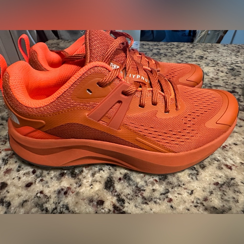 North Face women’s running shoes size 8. Burnt orange color.